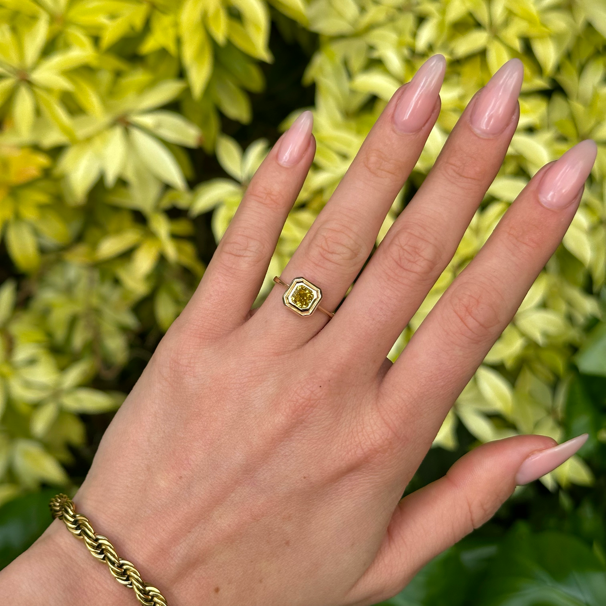 Vintage, Solitaire Yellow Diamond Ring, 14ct Yellow and White Gold worn on hand.