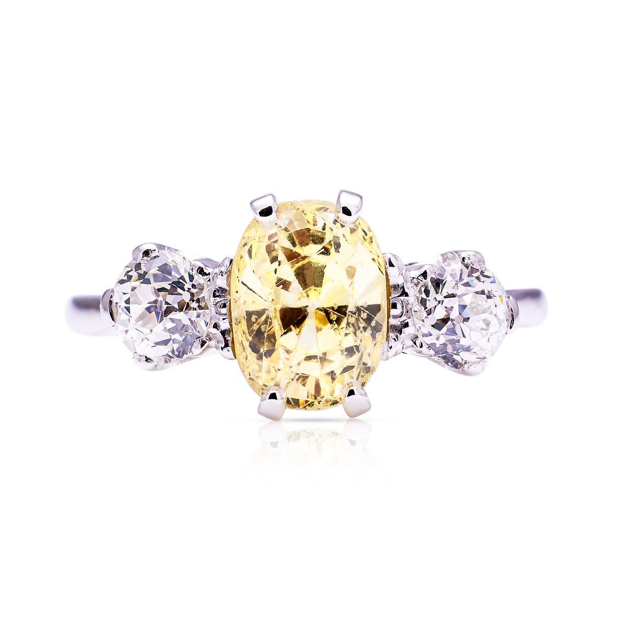 yellow sapphire and diamond three stone engagement ring, front view.