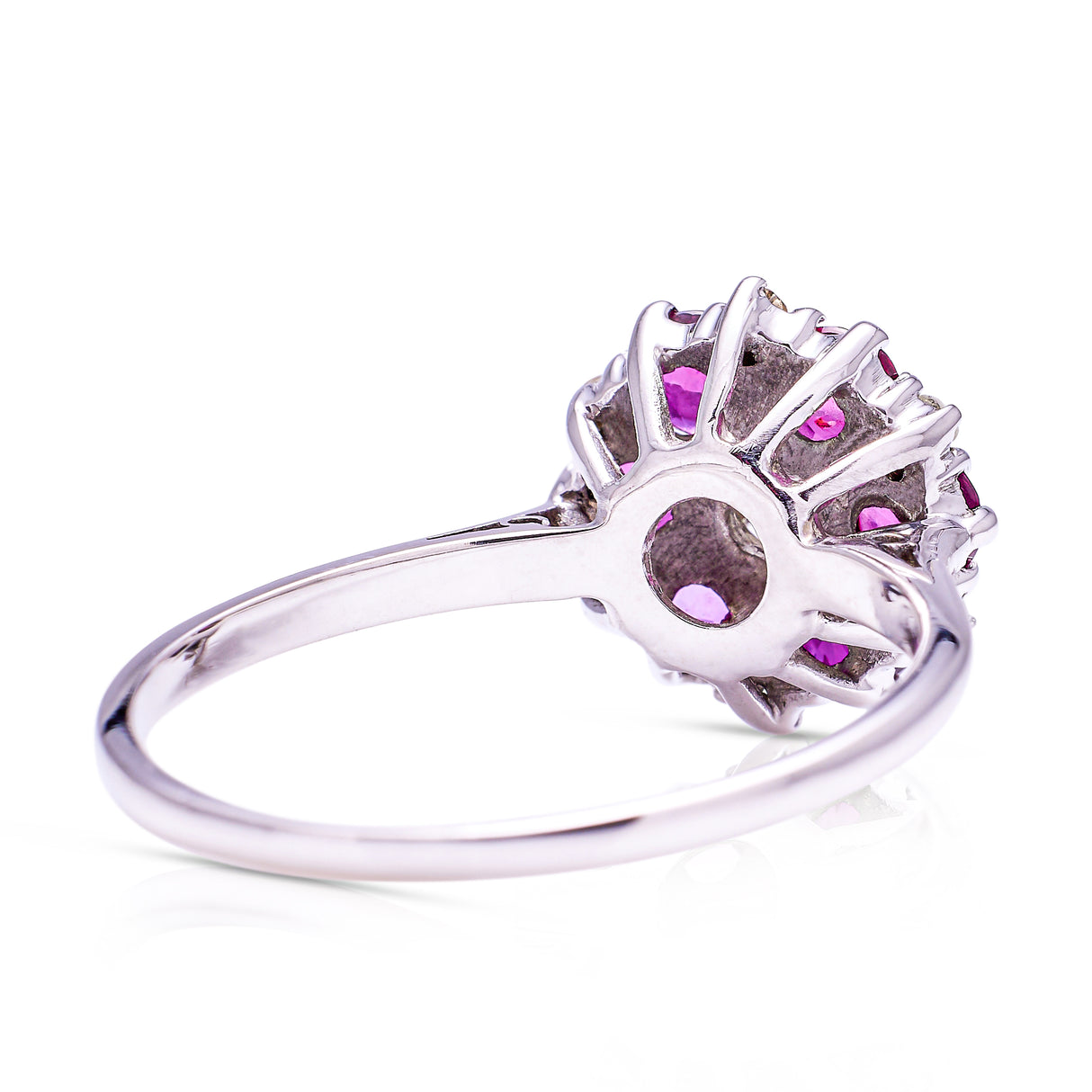 ruby and diamond cluster ring, side view.