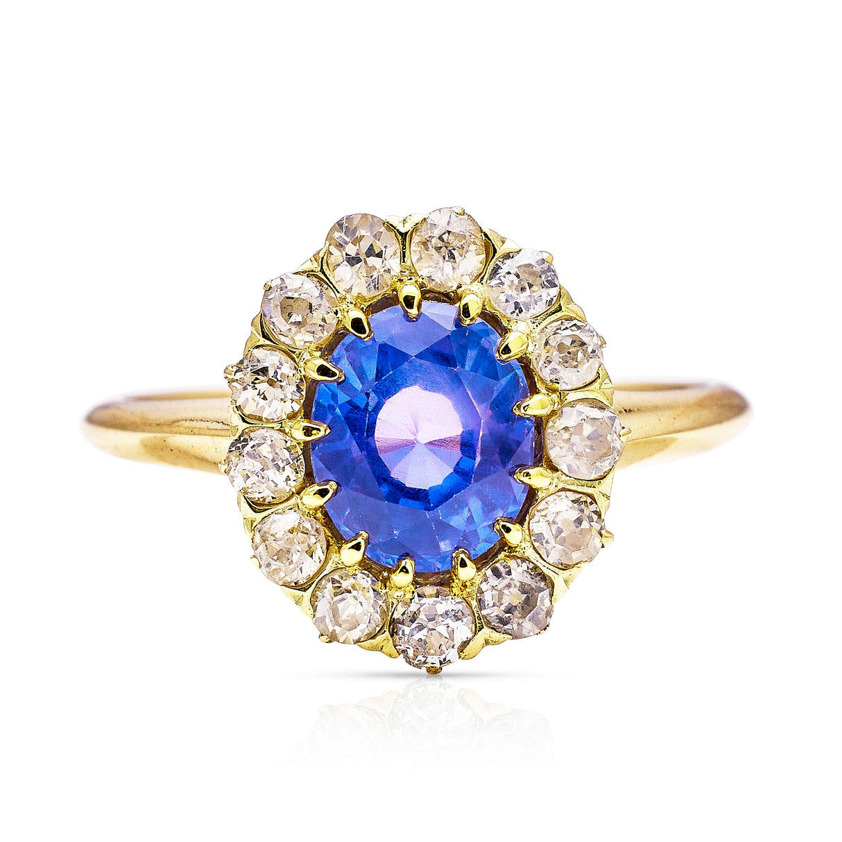 Antique, colour change oval sapphire and diamond cluster engagement ring