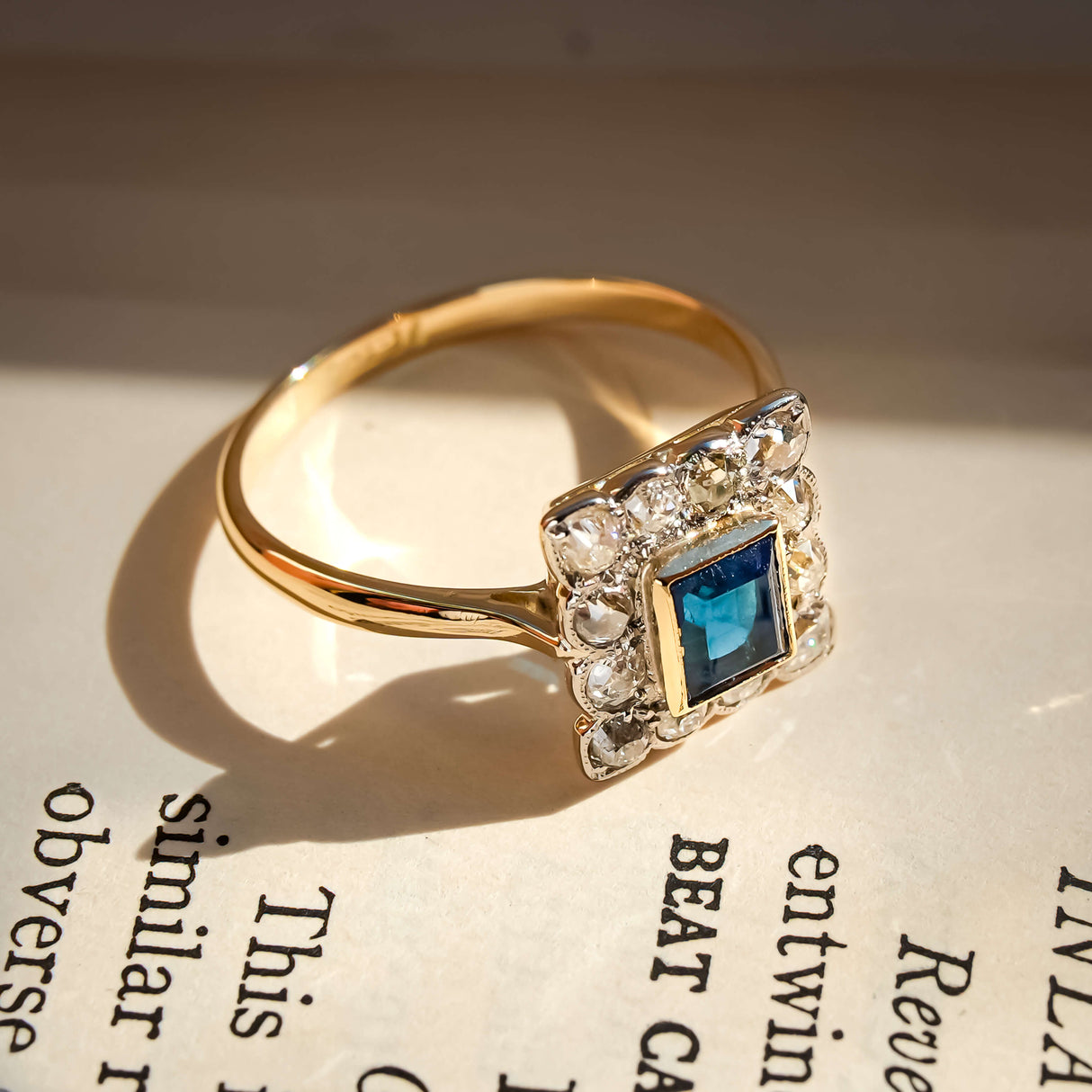 antique art deco sapphire and diamond cluster ring in yellow gold