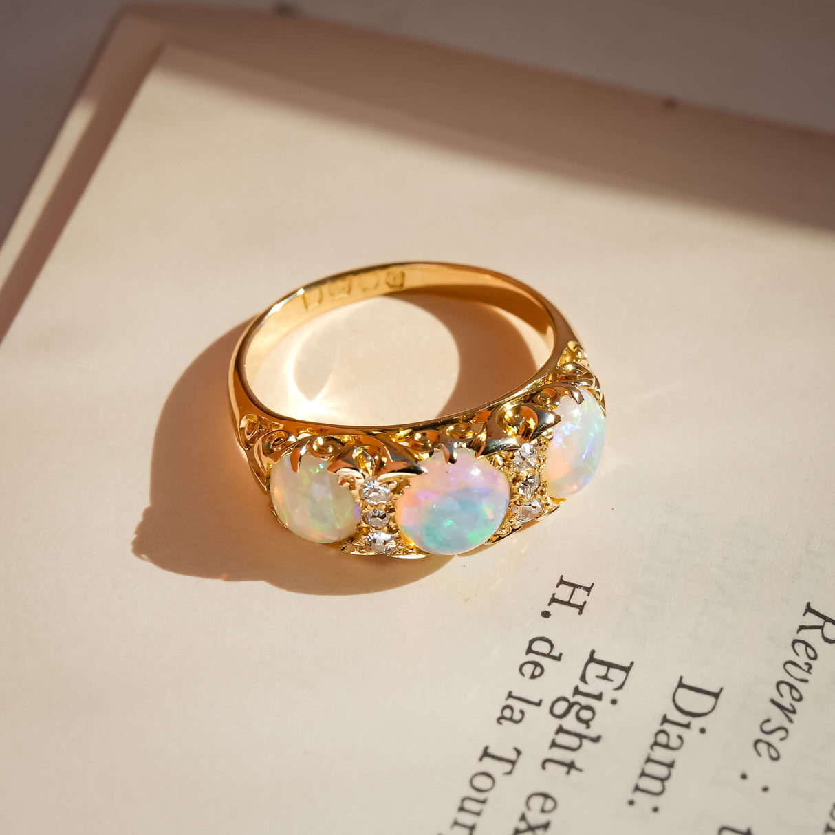 antique edwardian opal and diamond three stone ring in yellow gold