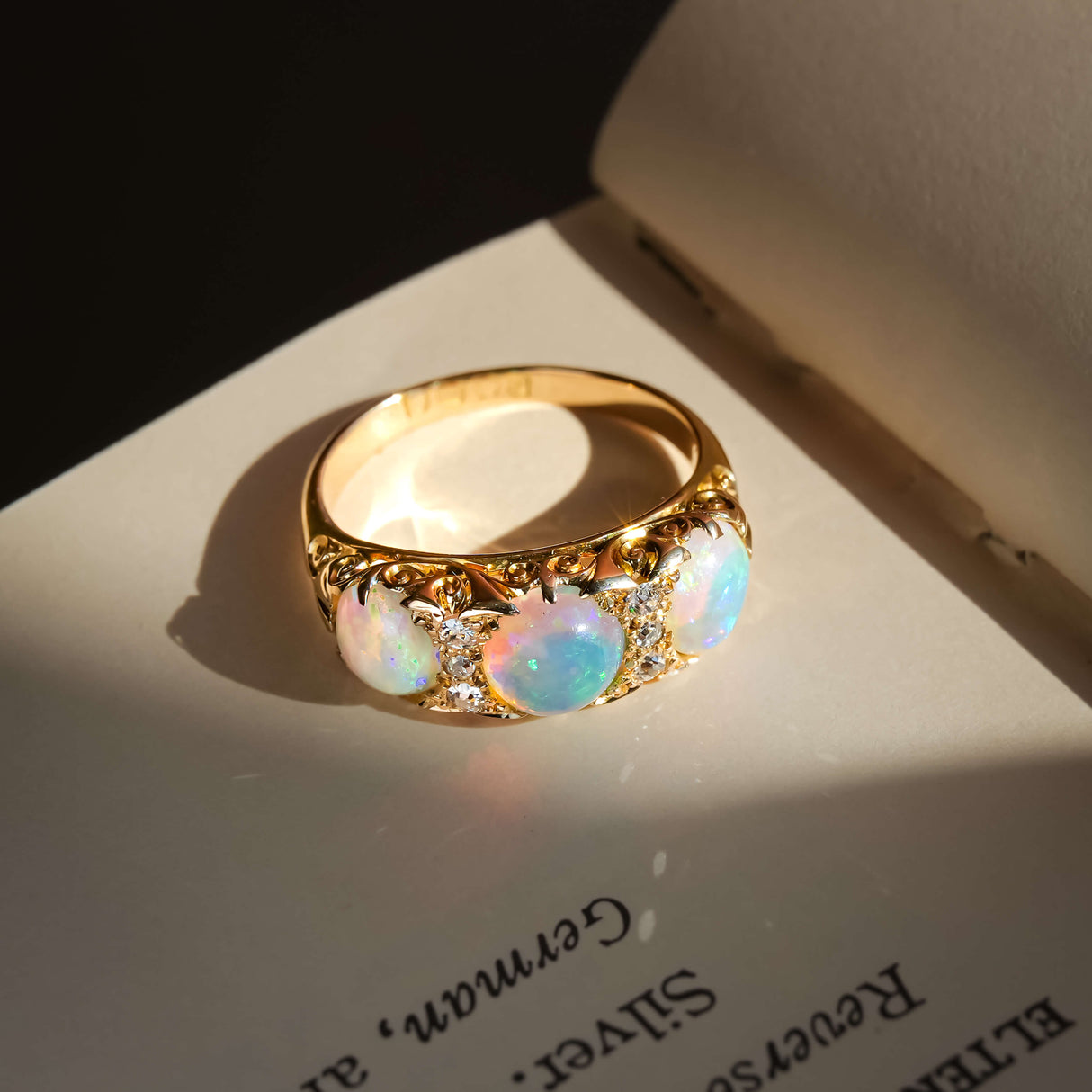 antique opal diamond three stone ring with edwardian style in yellow gold