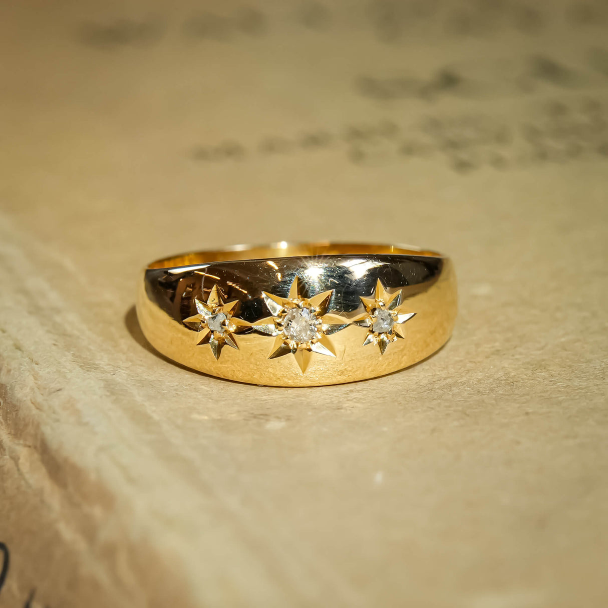 Antique three stone diamond gypsy ring with classic Edwardian design