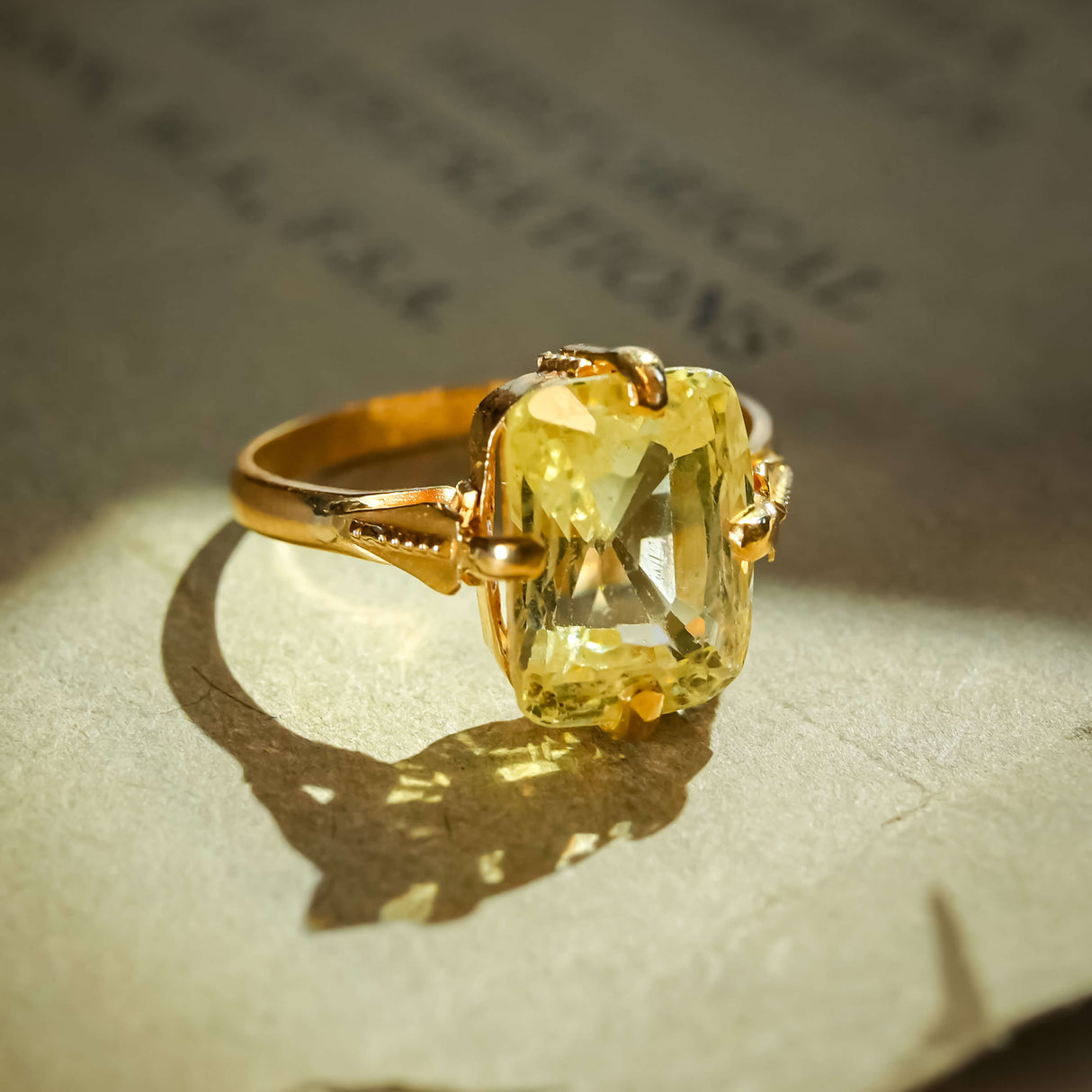 Antique Victorian yellow sapphire solitaire ring with elongated cushion stone