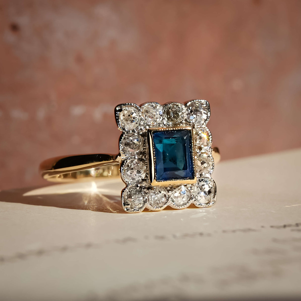 art deco square sapphire diamond cluster ring with halo setting