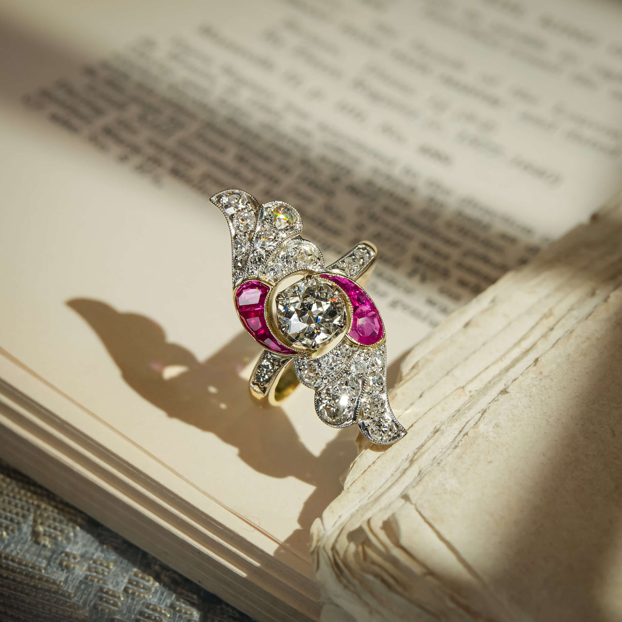 Antique Art Nouveau diamond and ruby cocktail ring with central diamond and ruby accents