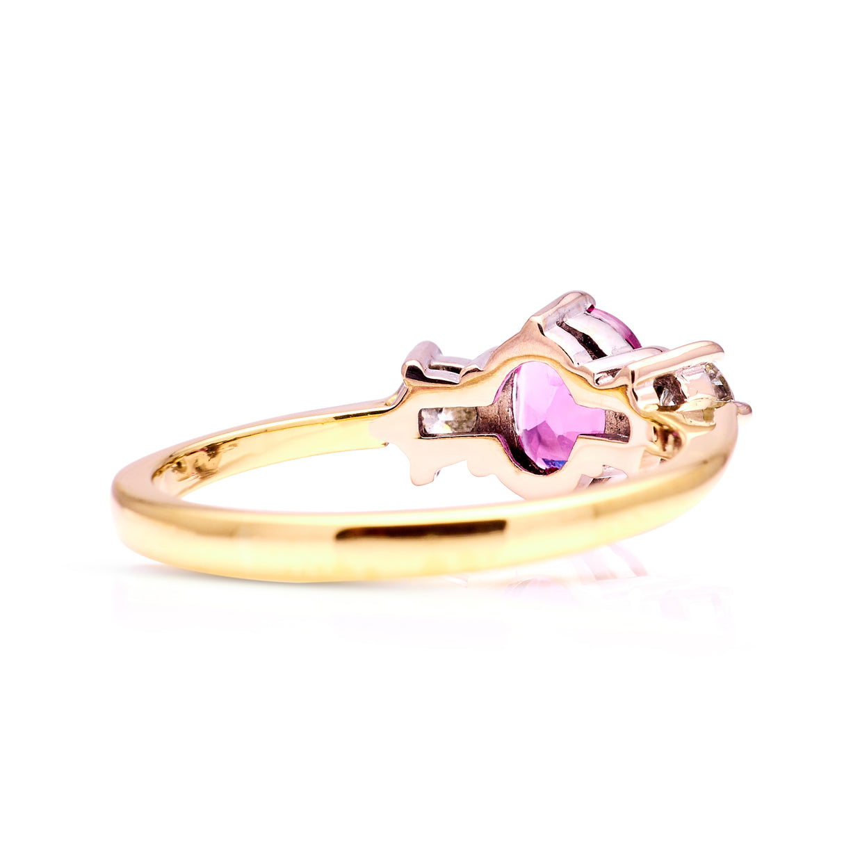 Vintage, 1990s pink sapphire and diamond three-stone ring