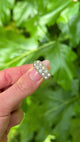 Antique, Victorian Double Row Pearl & Diamond Ring, 15ct Yellow Gold held in fingers.