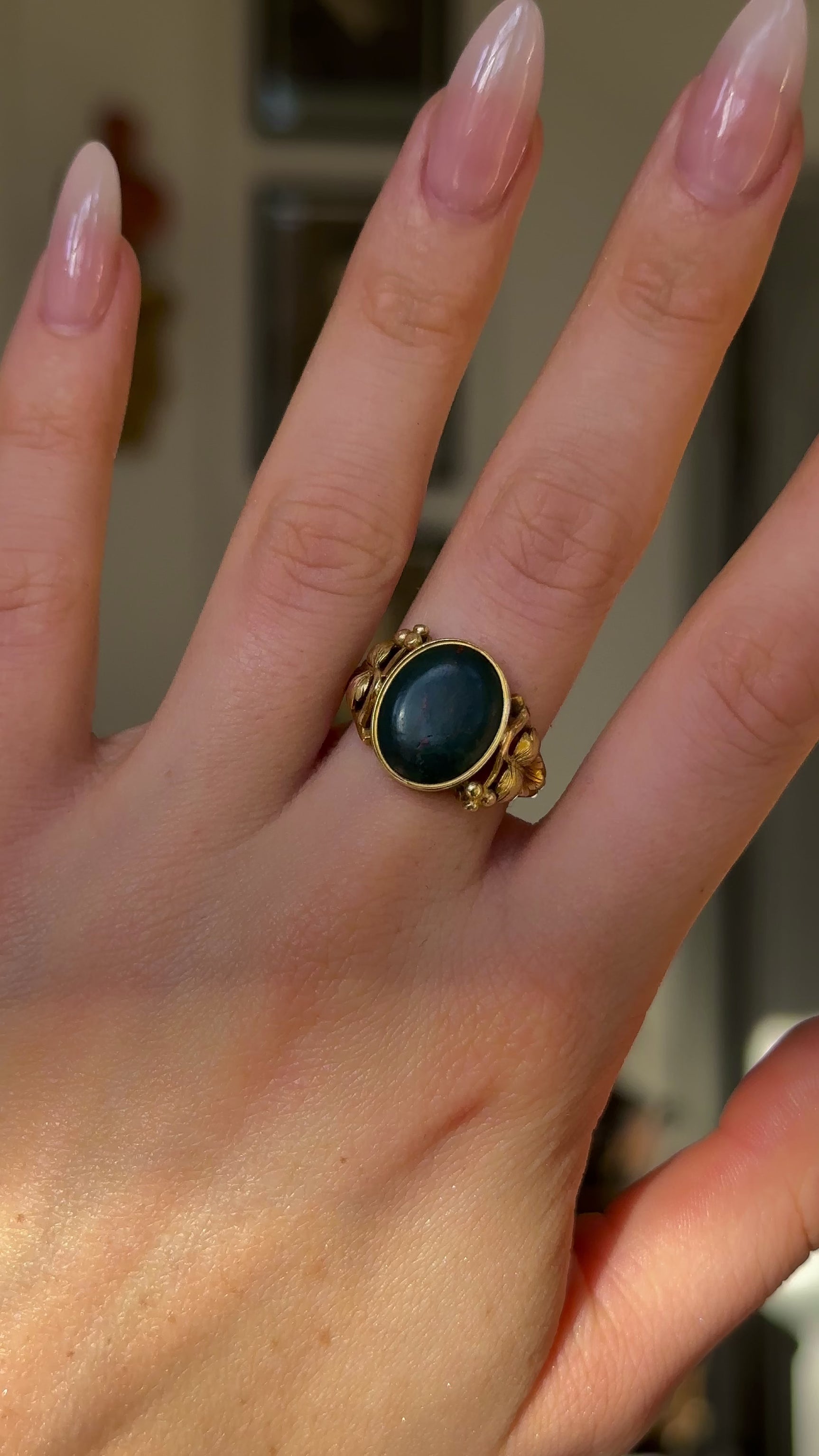 Antique, Victorian Bloodstone Signet Ring, 18ct Yellow Gold worn on hand and rotated to give perspective.