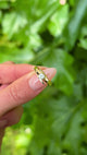 Vintage, Unique 1970s Diamond Engagement Ring, 18ct Yellow Gold held in fingers.