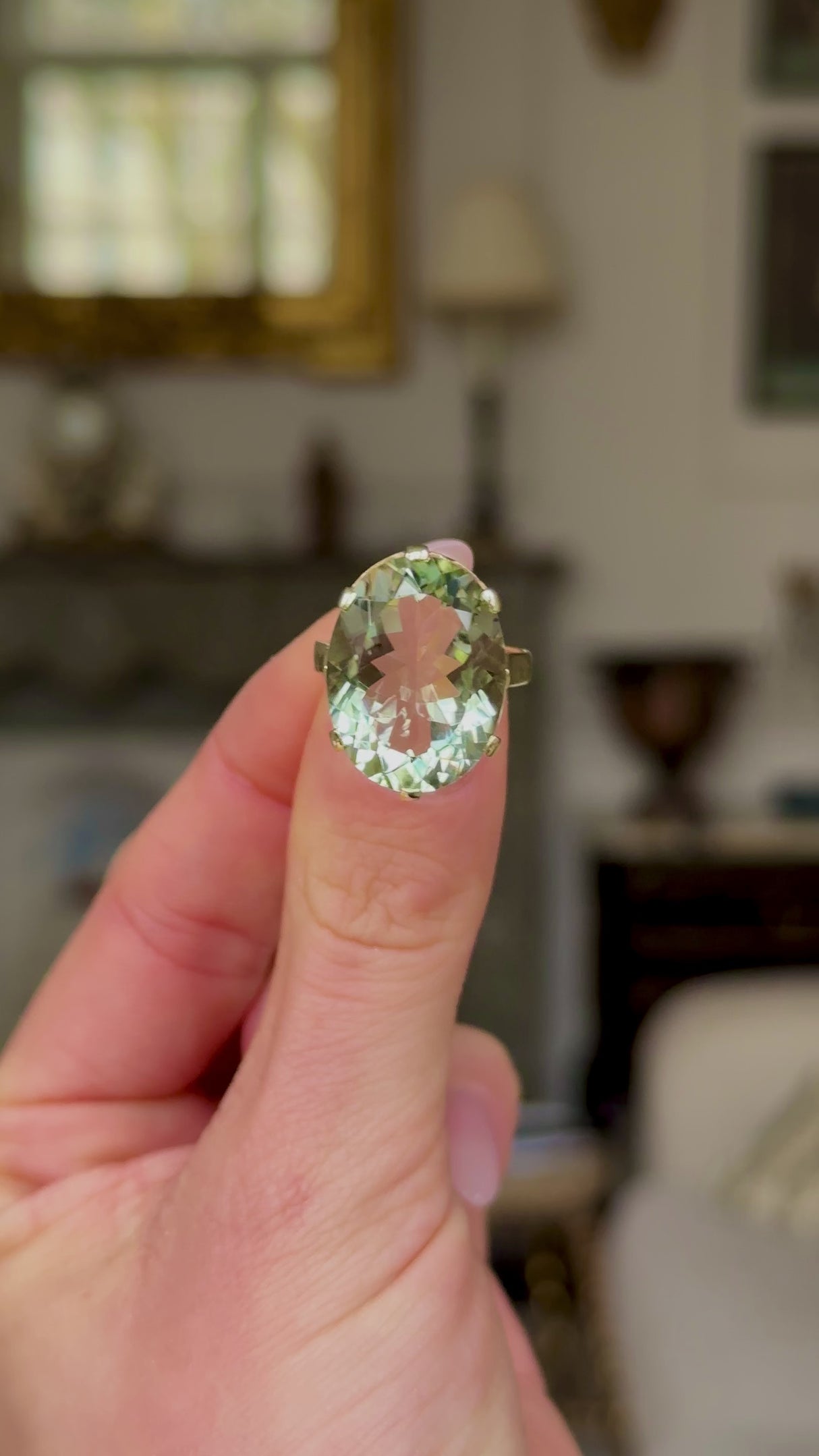 Vintage, Mint Quartz Cocktail Ring held in fingers and moved around to give perspective.