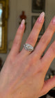 Vintage, Art Deco Diamond Three-Stone Engagement Ring, Platinum worn on hand and rotated to give perspective.