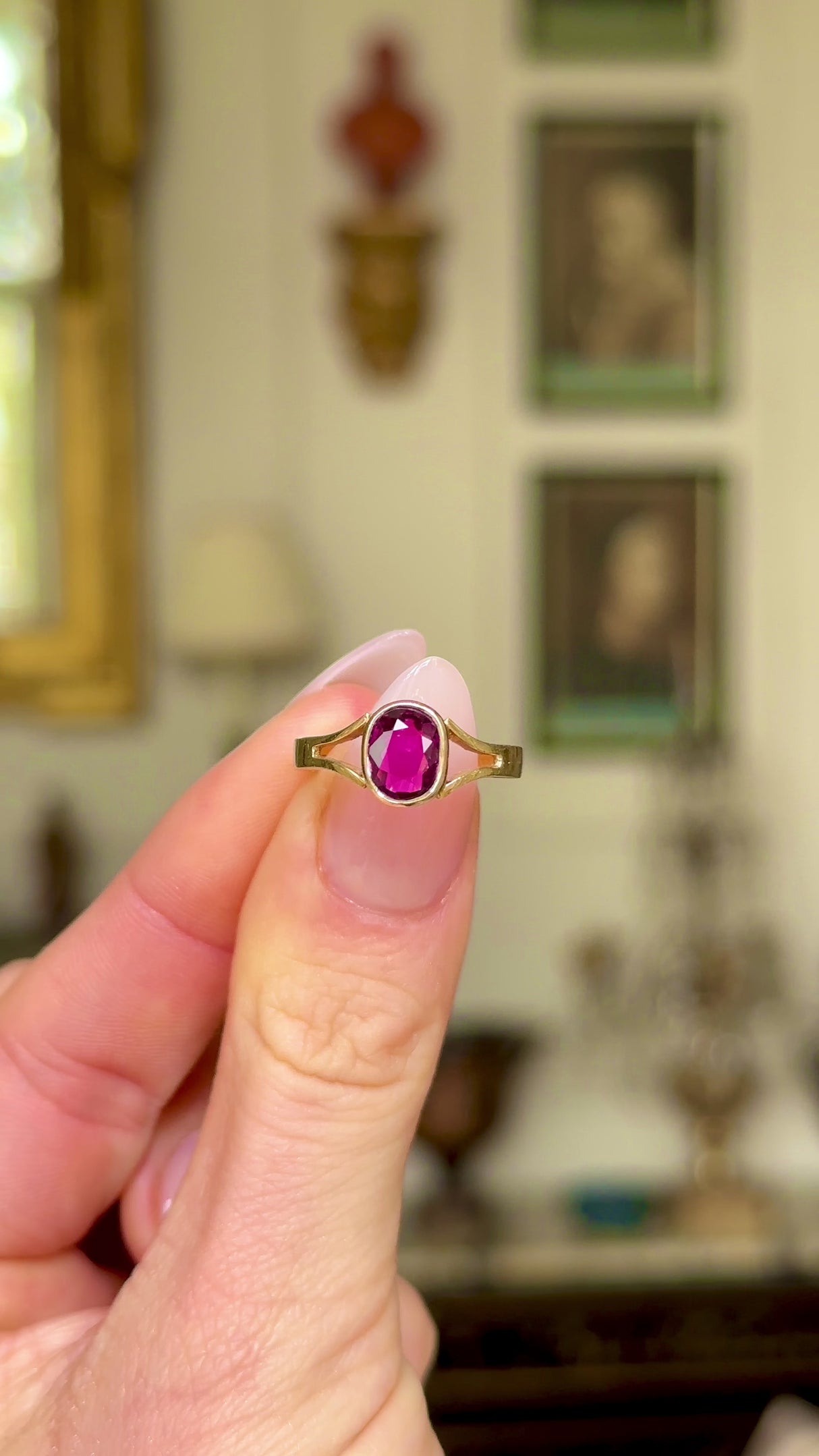 Vintage single-stone ruby and yellow gold ring, moved around to give perspective.