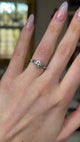 Vintage, 1950s Diamond Engagement Ring, 14ct White Gold and Platinum worn on hand and rotated to give perspective.