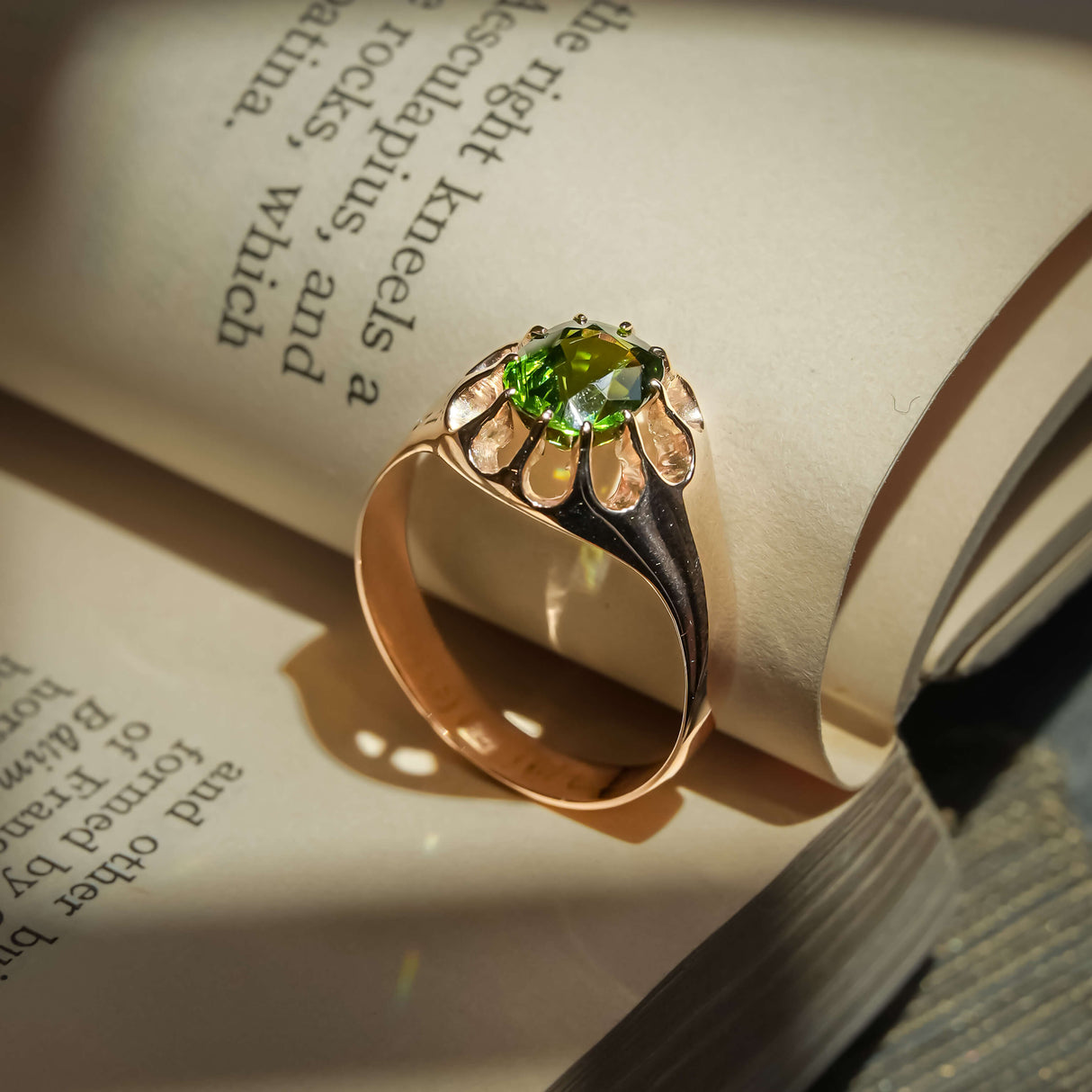 Victorian green zircon solitaire ring with round green gemstone in gold