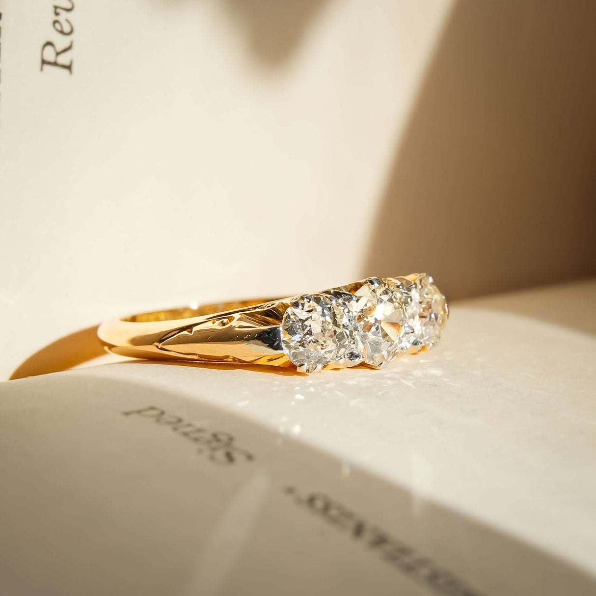 victorian three stone diamond ring with yellow gold band