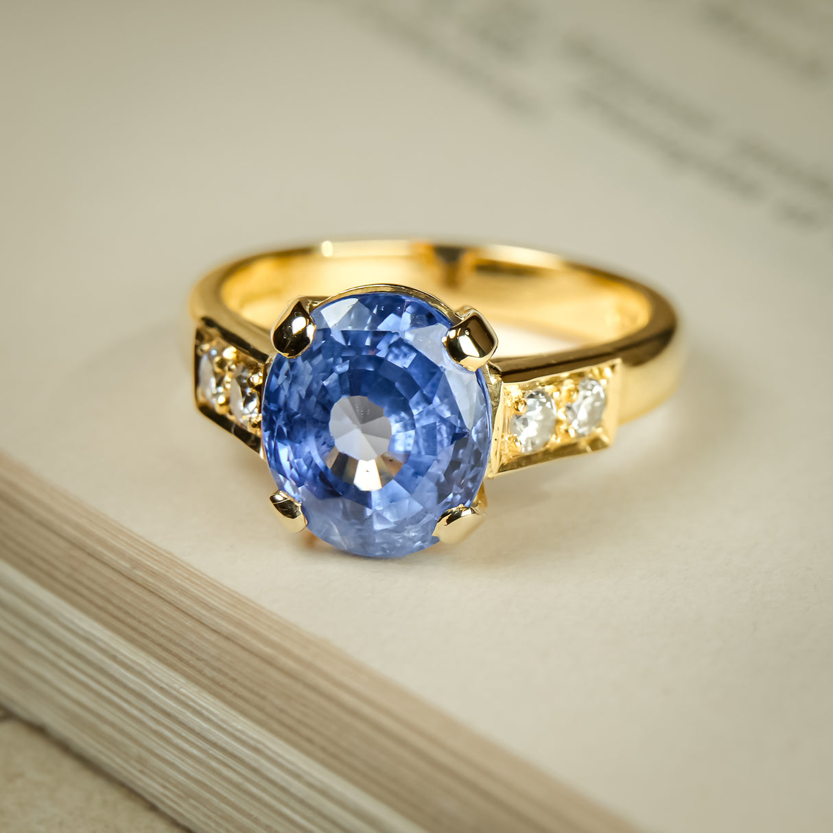 Vintage 1990s blue sapphire and diamond engagement ring in yellow gold
