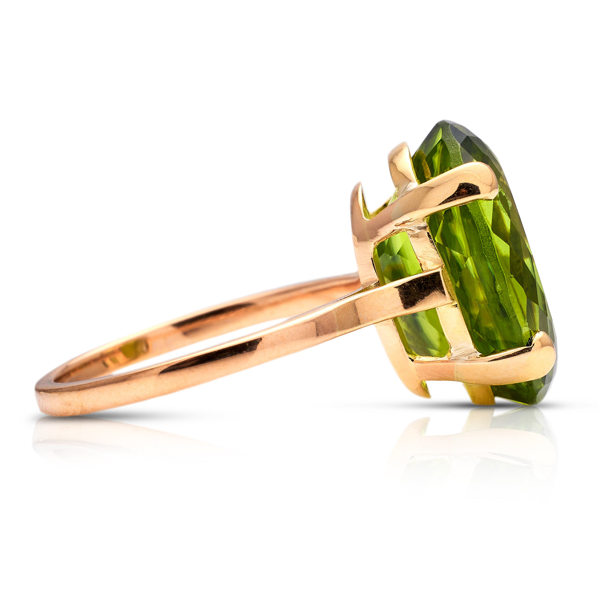 French | a large oval 12ct peridot ring, 18ct gold