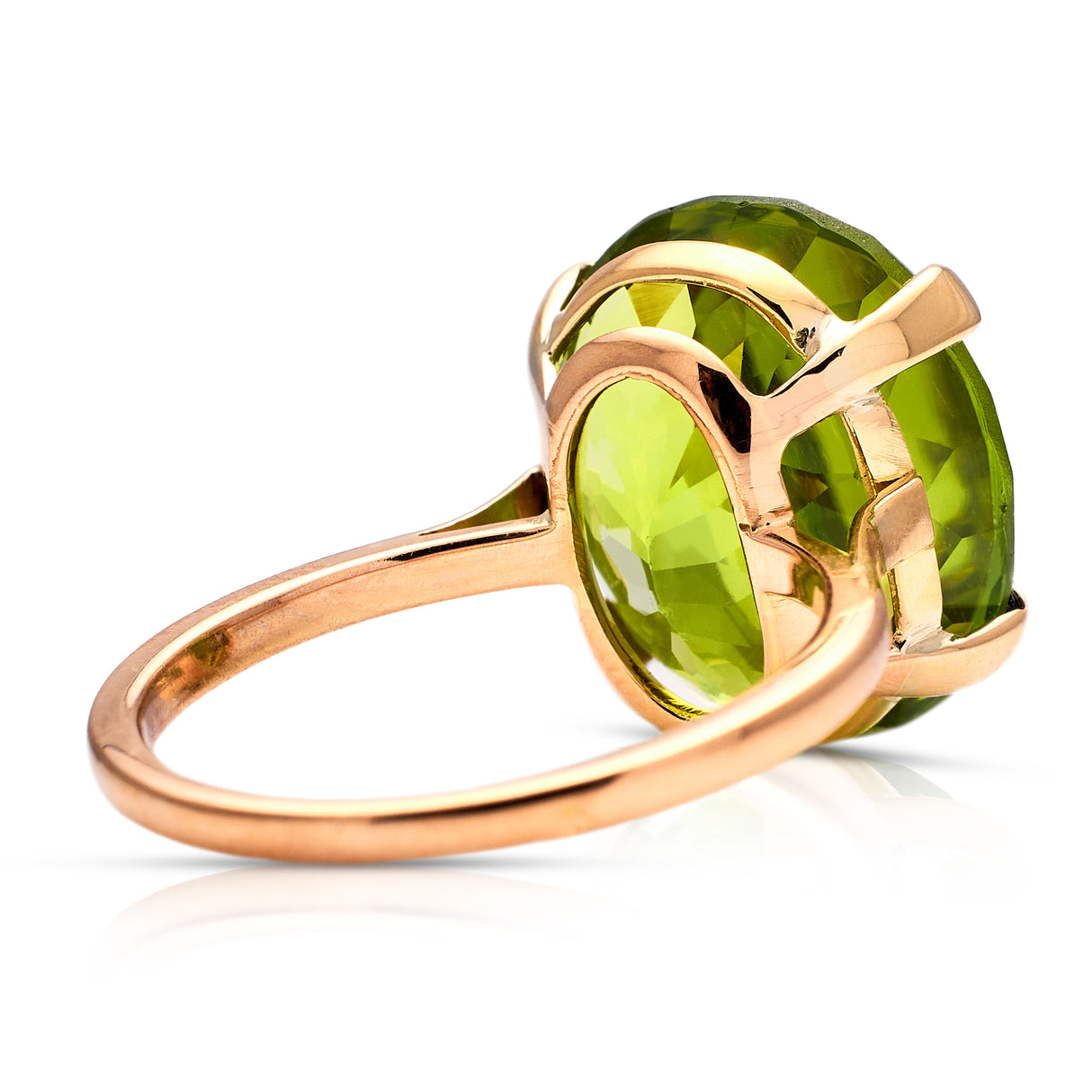 French | a large oval 12ct peridot ring, 18ct gold