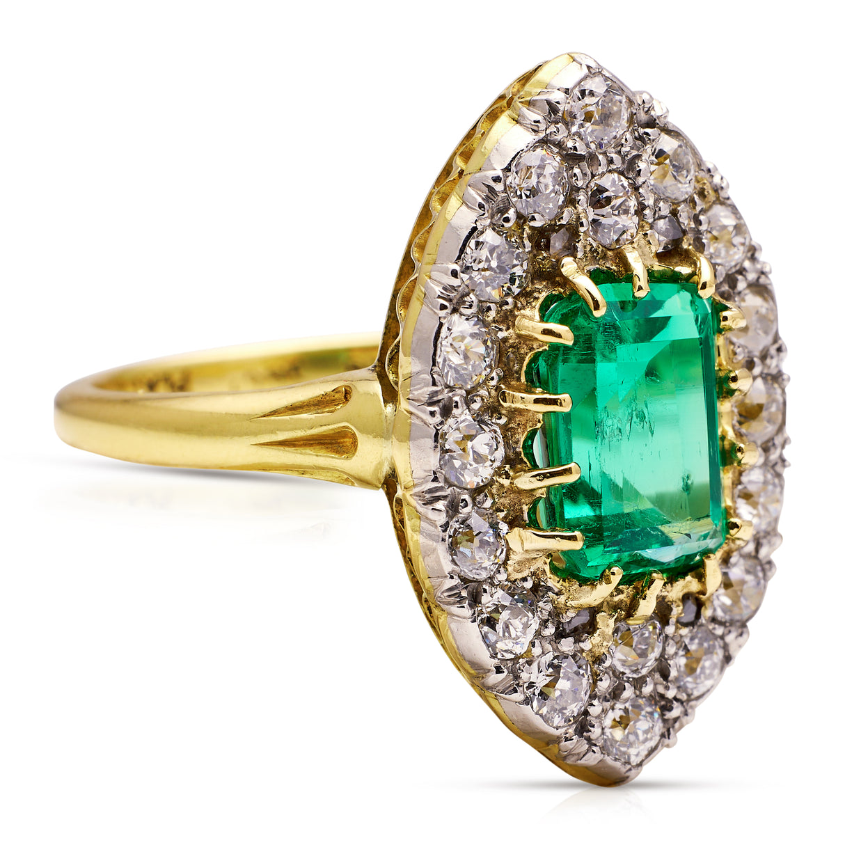 Emerald and diamond navette ring, side view. 