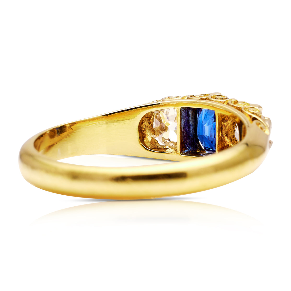 Sapphire and diamond three stone ring, rear view.