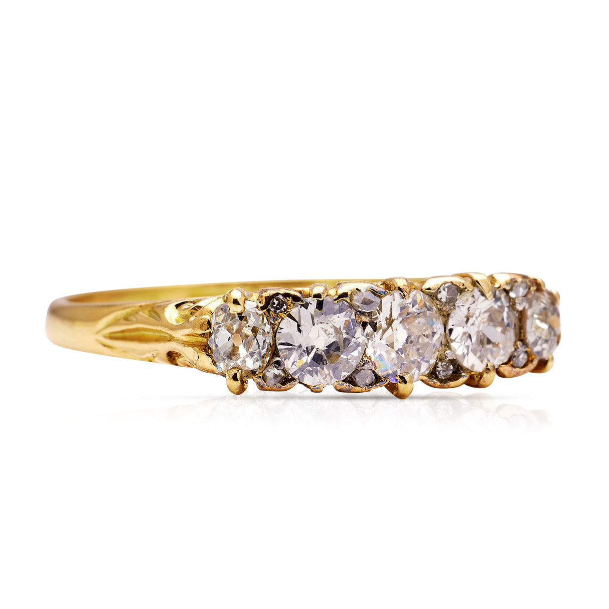 Antique five-stone diamond engagement ring, side view.