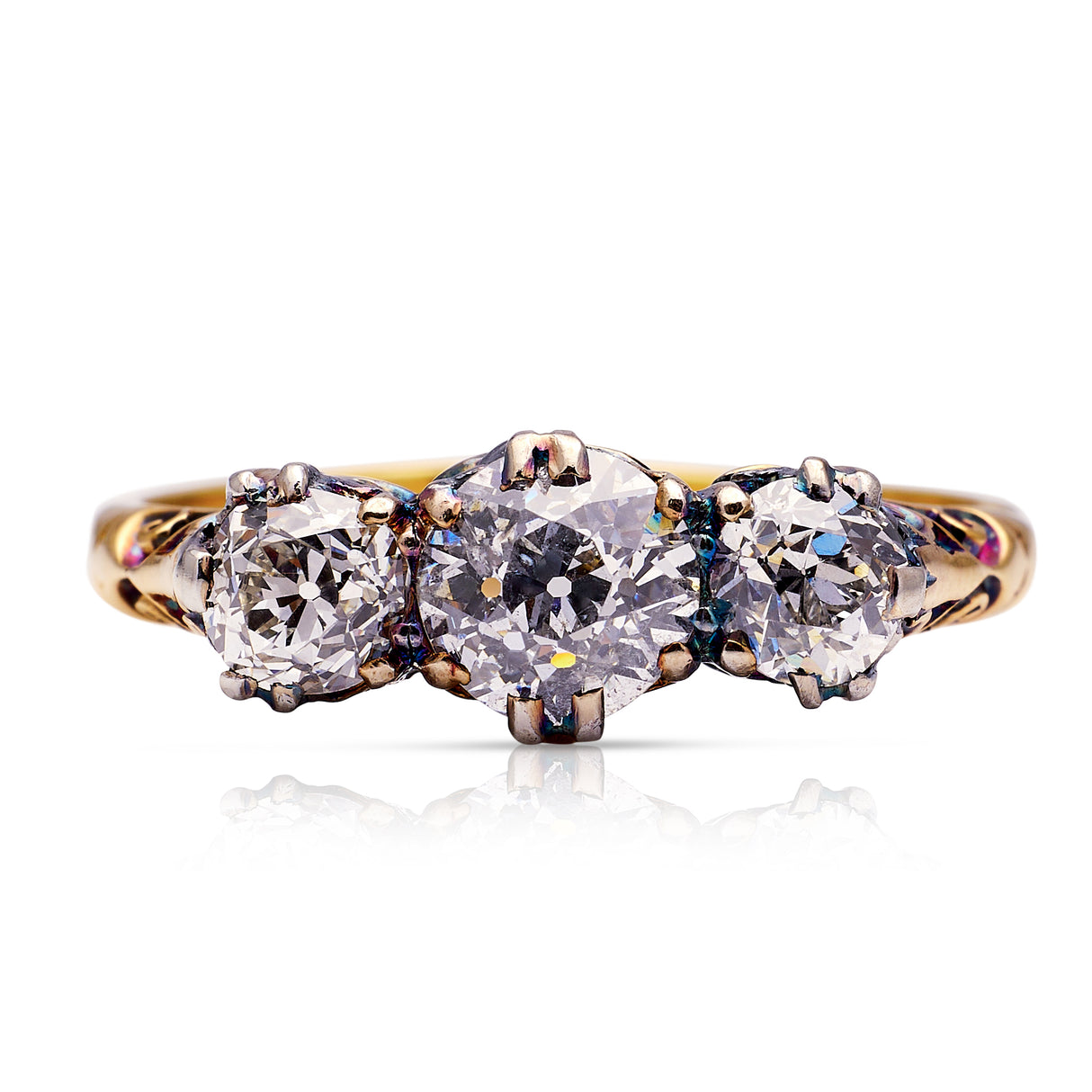 Antique Edwardian three-stone diamond engagement ring, front view.
