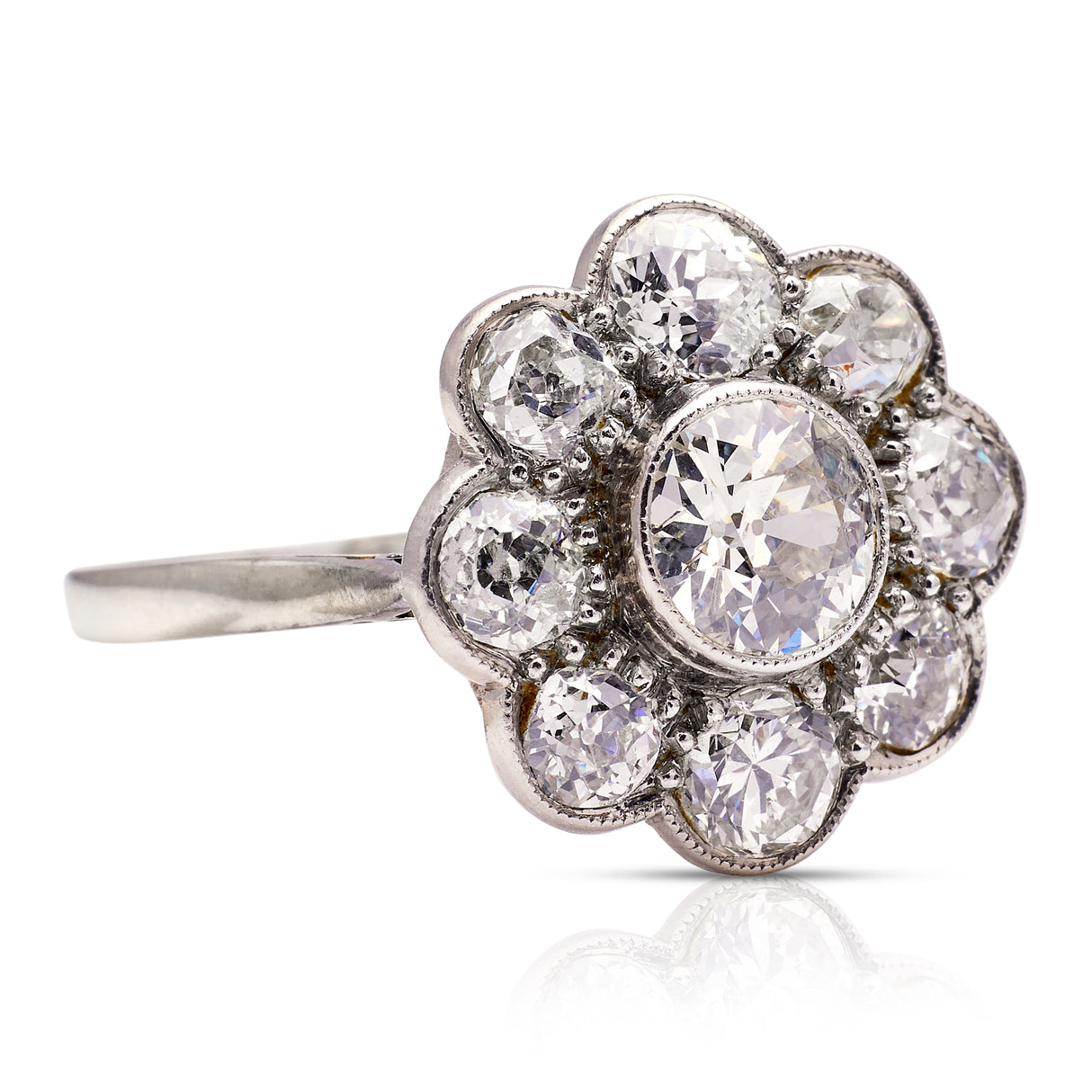 Diamond daisy cluster ring, side view.