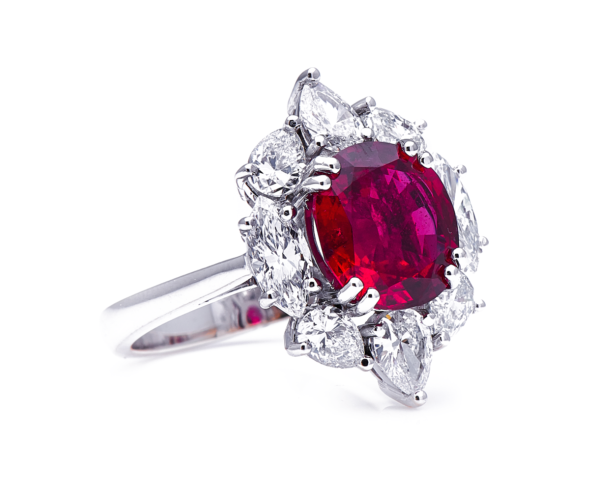 18ct white gold, ‘pigeon’s blood’ 4.27ct ruby and diamond cluster ring