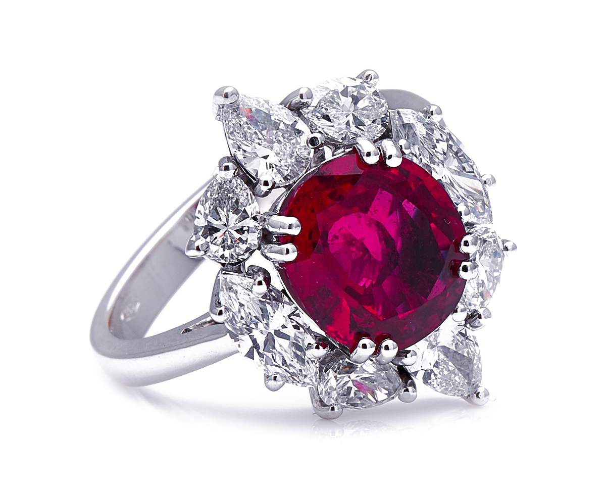 18ct white gold, ‘pigeon’s blood’ 4.27ct ruby and diamond cluster ring