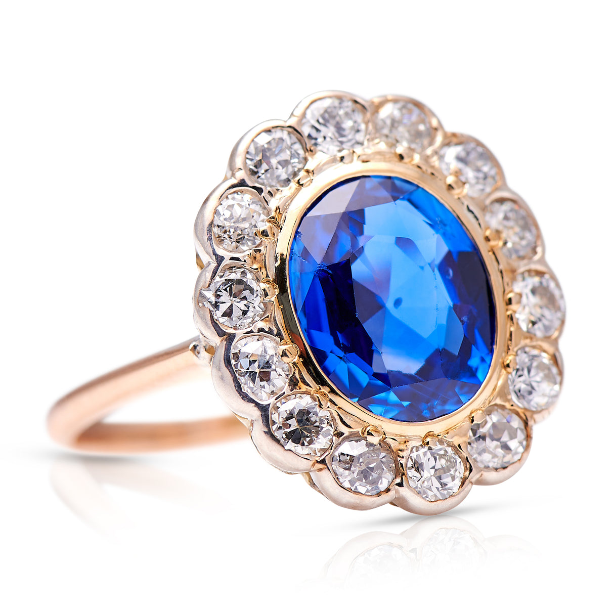 Edwardian | 18ct gold, natural Burmese sapphire and diamond cluster ring