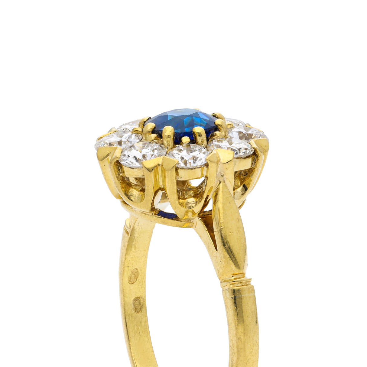 Sapphire and diamond cluster engagement ring, 18ct yellow gold