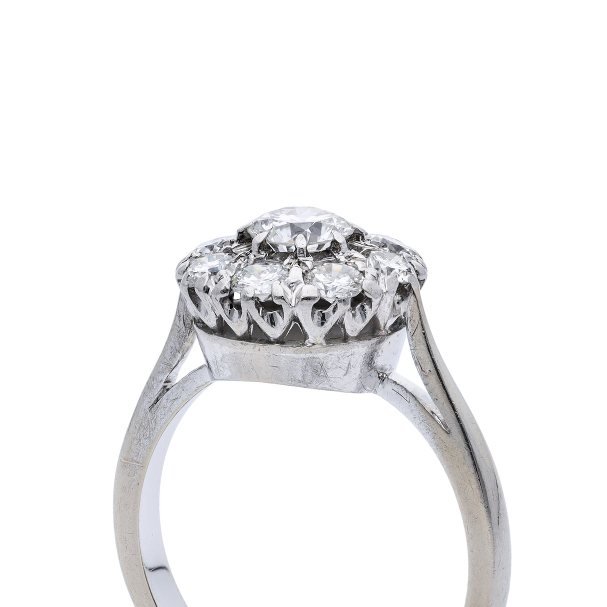 Vintage Art Deco white gold diamond cluster engagement ring, side view.