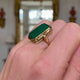 Art Deco chrysoprase and yellow gold ring, worn on hand and moved away from camera to give perspective.