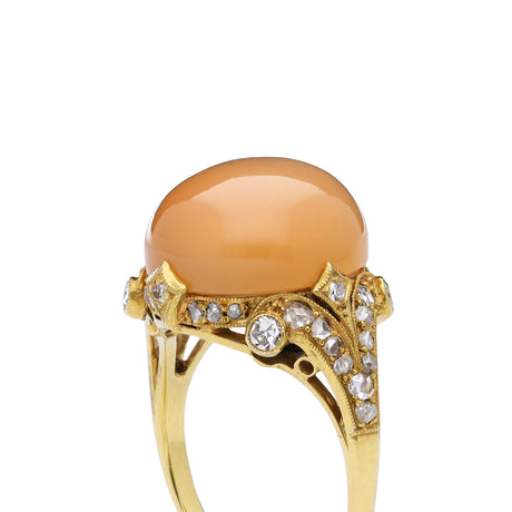 Belle Époque, 18ct gold, cabochon peach moonstone & diamond ring