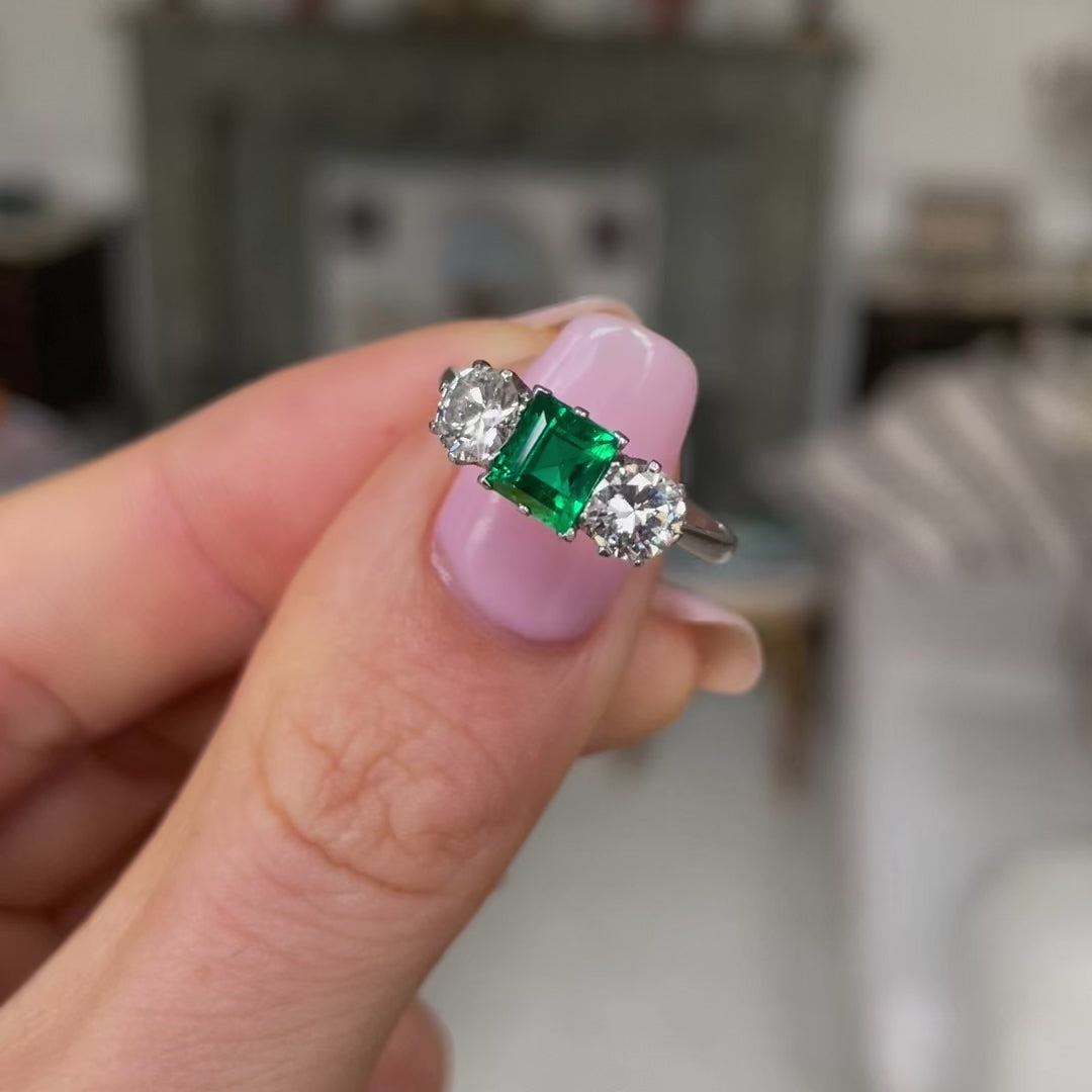 Fine quality | Art Deco, platinum, emerald & diamond three-stone ring