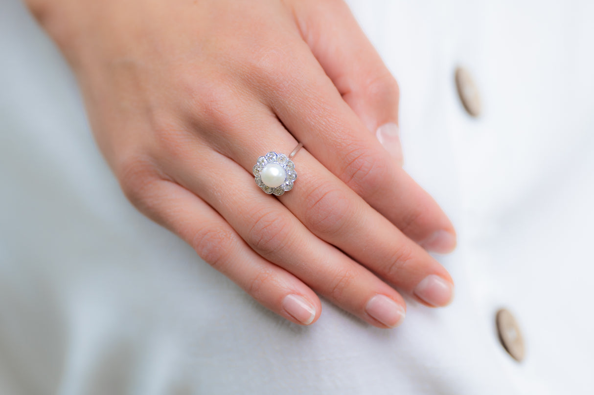 Edwardian, platinum, natural pearl and diamond cluster ring