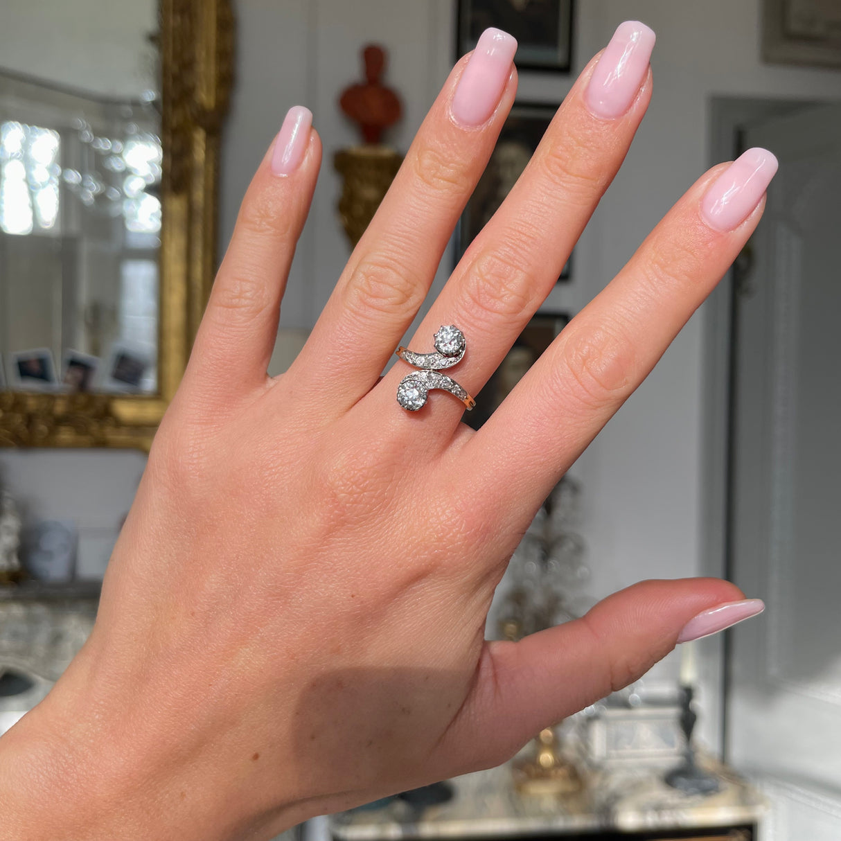 vintage toi et moi diamond ring, worn on hand.