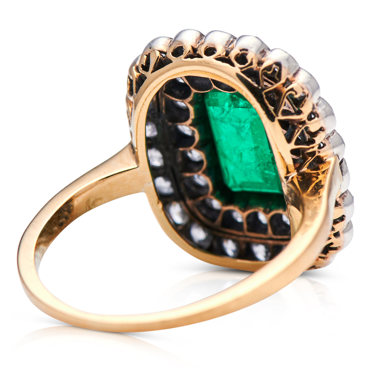 Edwardian, 18ct gold, Colombian emerald and diamond cluster ring