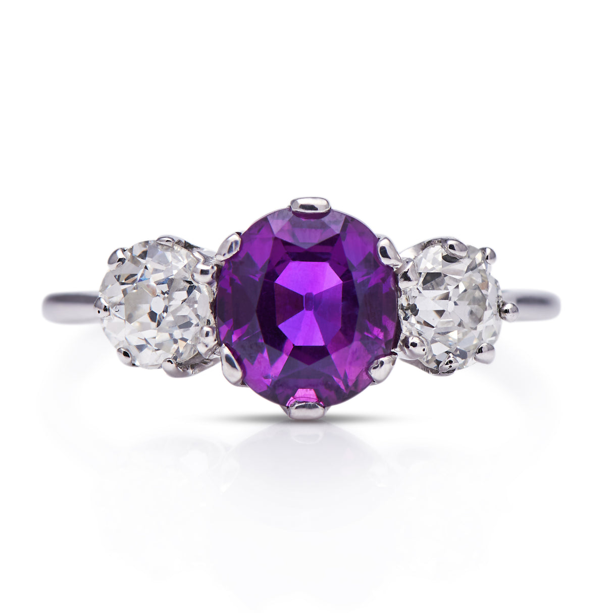 Art Deco, purple sapphire and diamond three-stone engagement ring, platinum