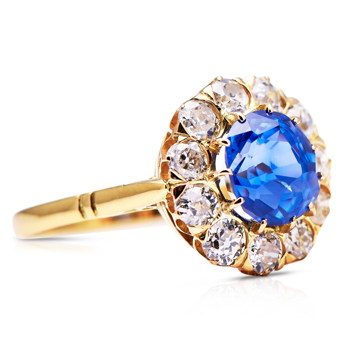 Antique | Edwardian, ceylon sapphire and diamond cluster ring