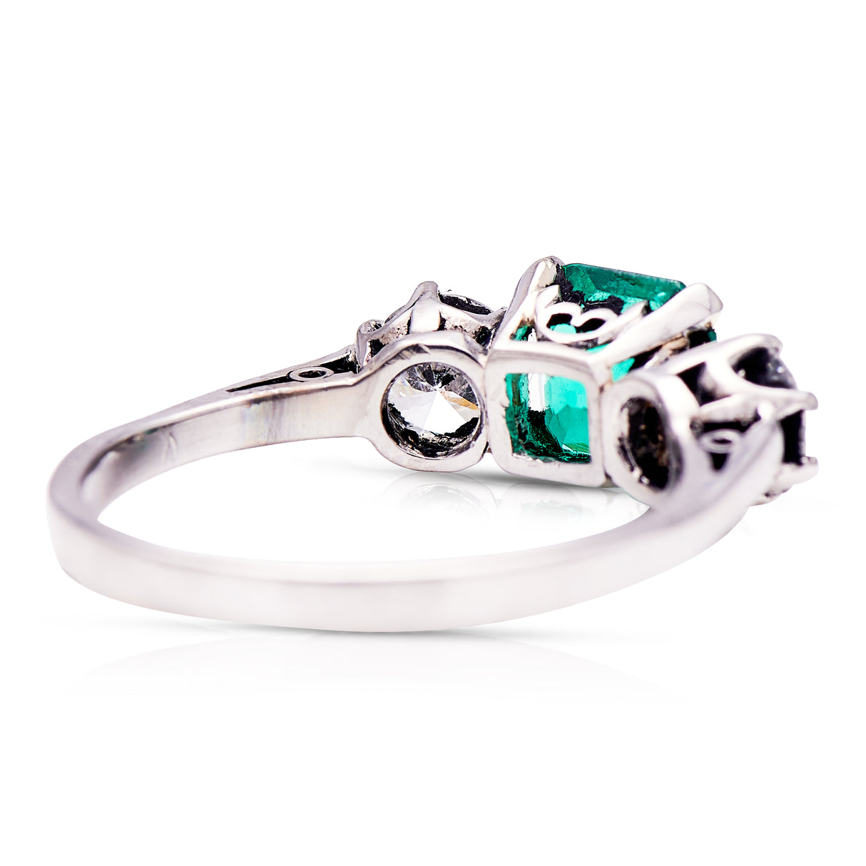 Colombian emerald | Art Deco, platinum, emerald and diamond three stone ring
