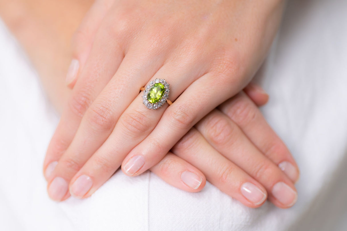Art Deco, 18ct gold, peridot and diamond cluster ring