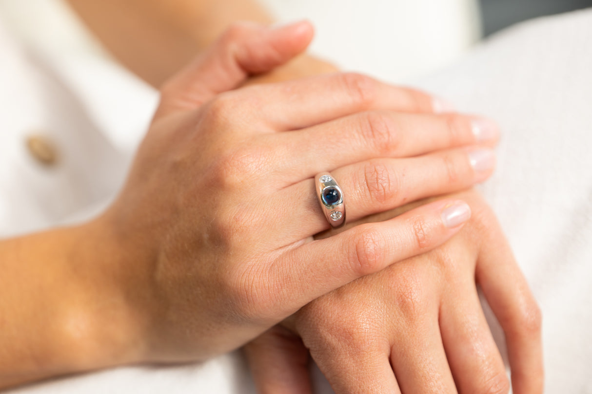 Art Deco, 18ct white gold, cabochon sapphire and diamond ring