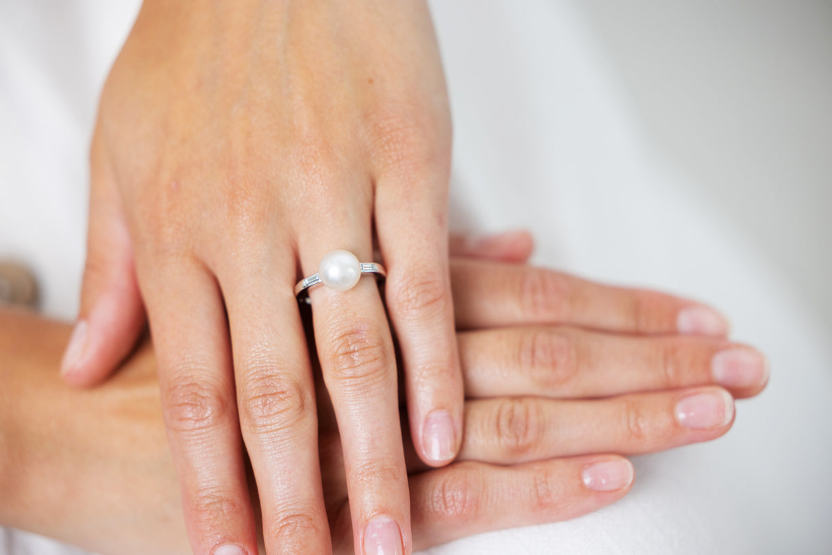 Natural pearl and baguette diamond ring