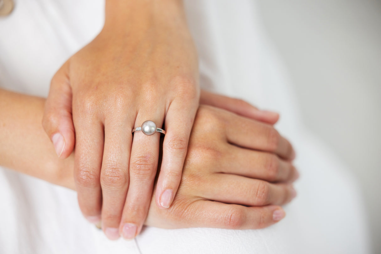 Natural pearl and baguette diamond ring