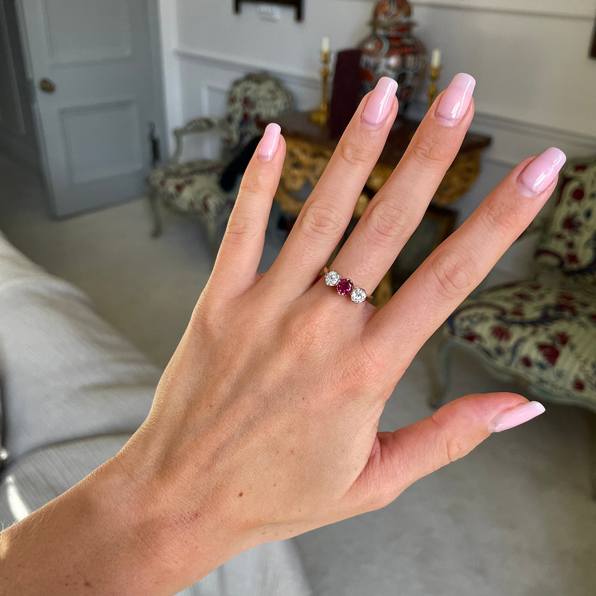 Edwardian, 18ct gold, platinum, ruby and diamond three-stone ring