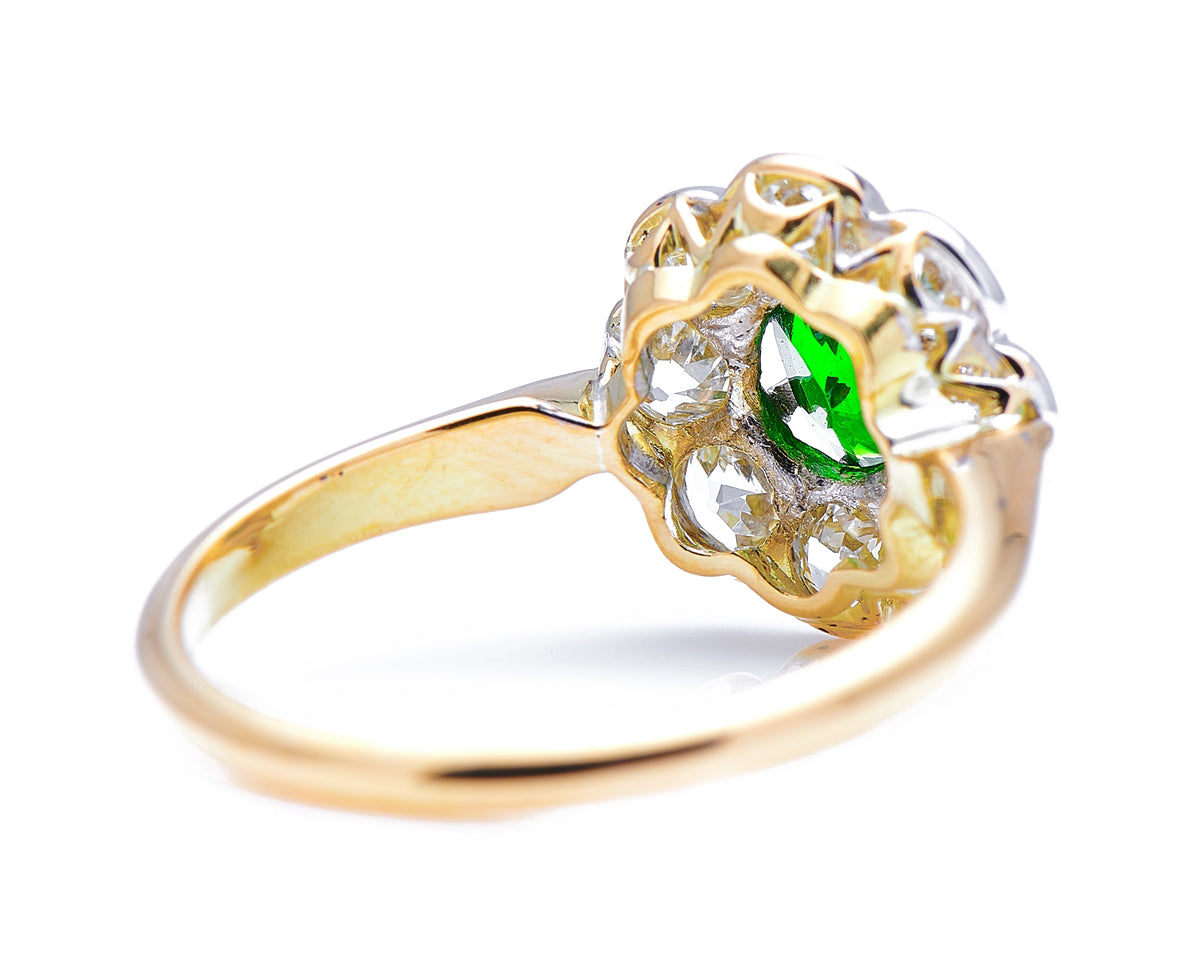 Edwardian, 18ct gold, demantoid garnet and diamond cluster ring