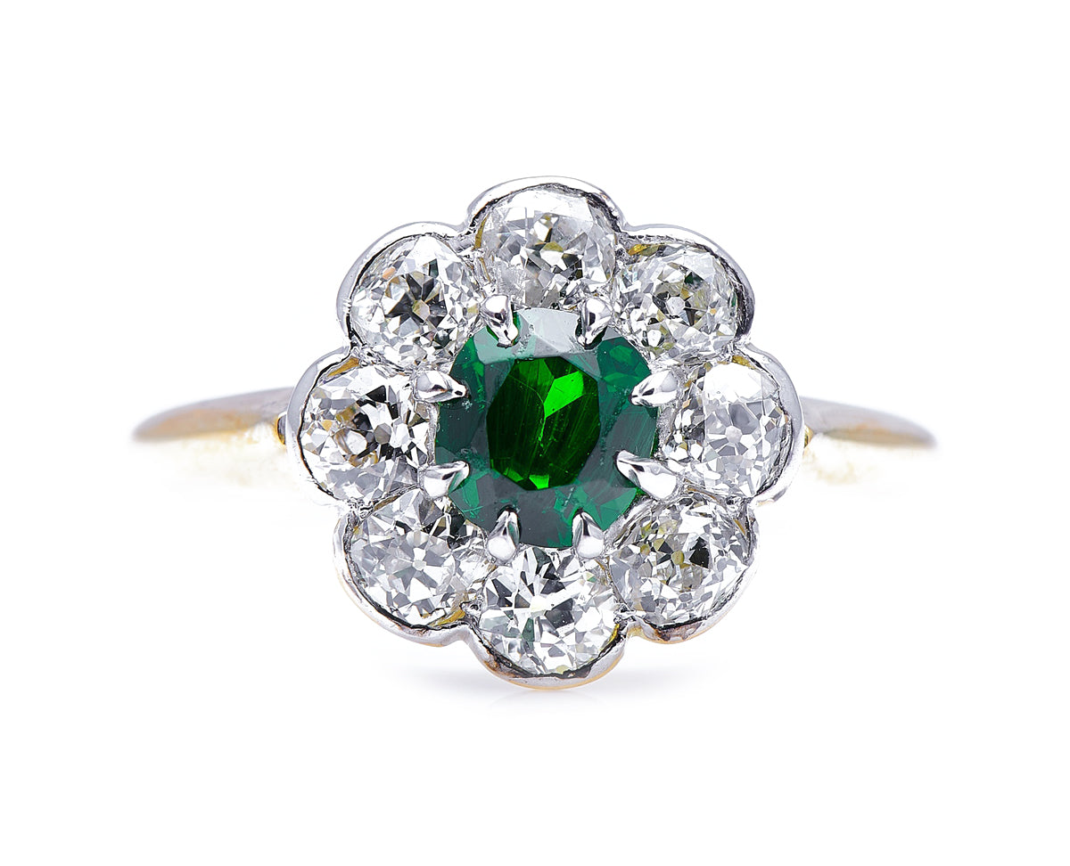 Edwardian, 18ct gold, demantoid garnet and diamond cluster ring